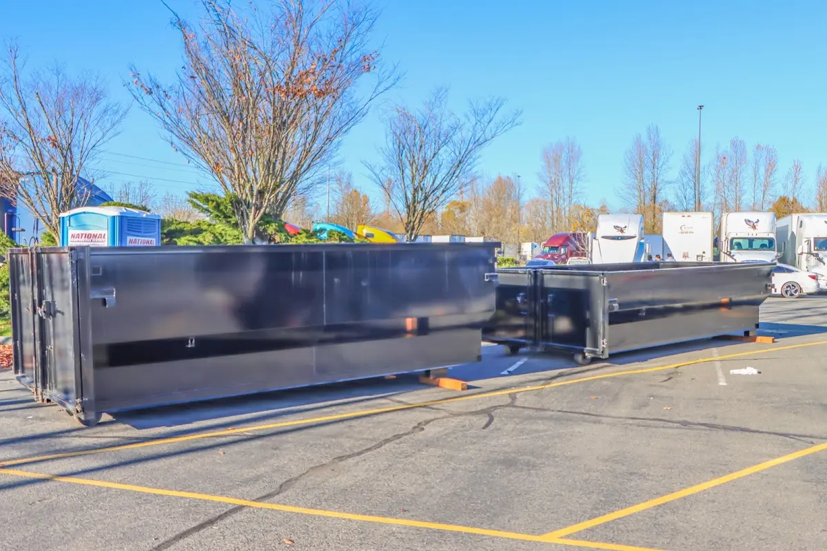 Professional dumpster rental service with roll-off container on residential driveway in Homosassa Springs